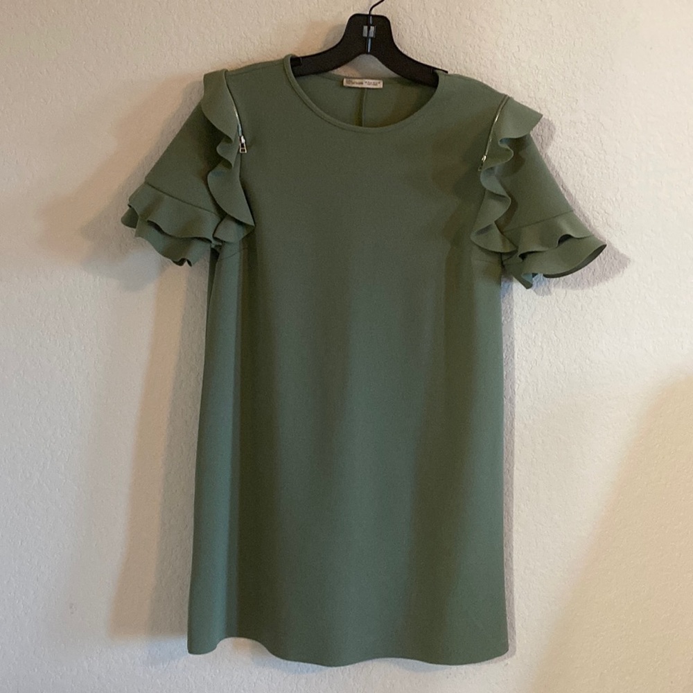 Shirt dress in olive green ruffles on the sleeve never worn brand new no tags.